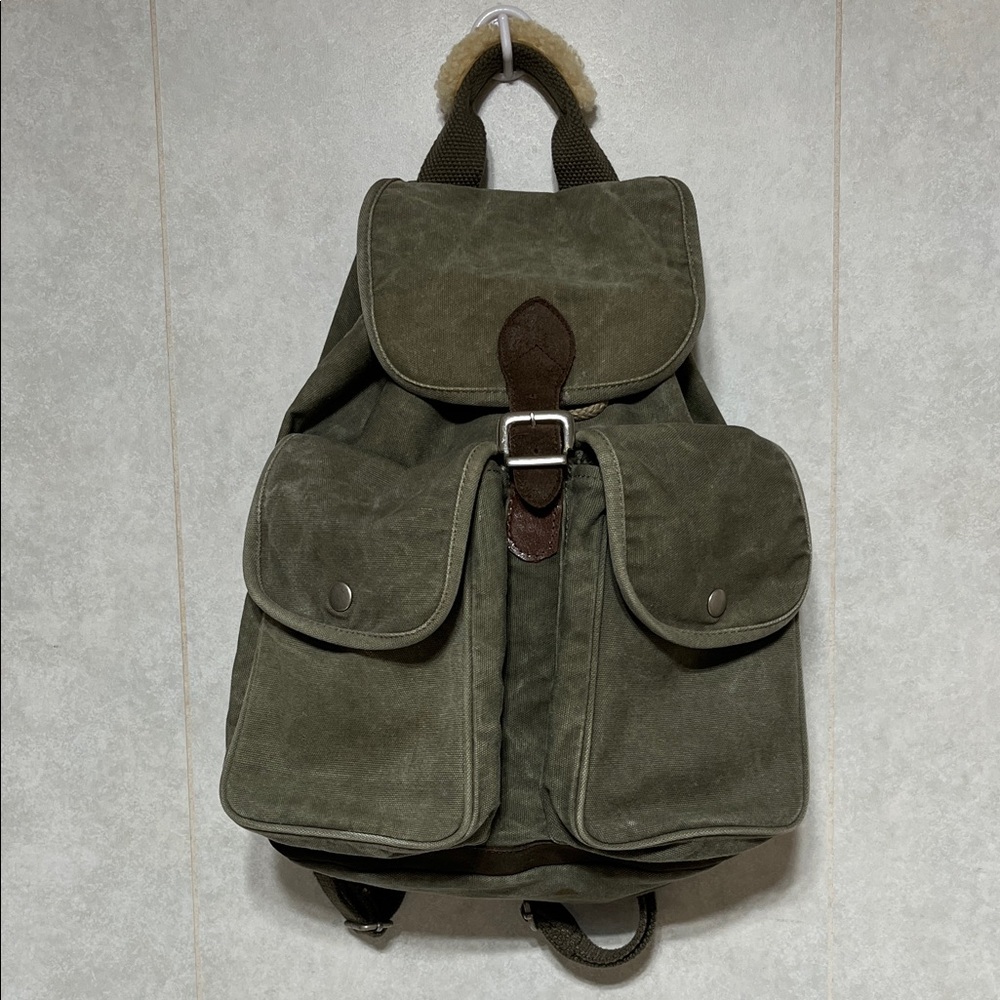 Backpack well-loved distressed dark green and brown 14x12x7 side zip opening